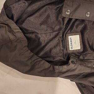 A water resistant rain coat